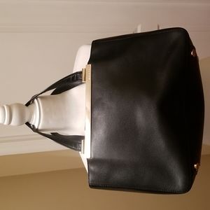 Michael Kors black with gold hardware bag